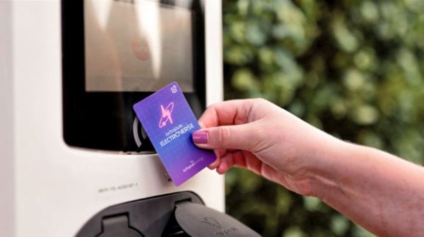 Person paying for an electric vehicle